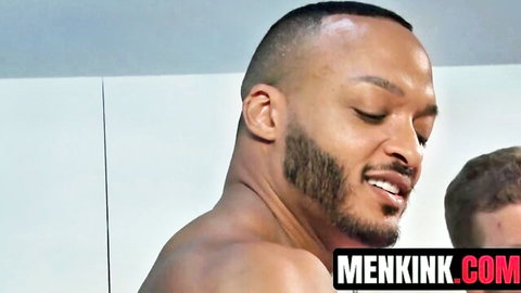 Draven Navarro smiling in gay gangbang with Pierce Paris