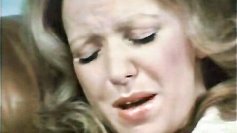 Vintage blonde in ecstasy close-up from 1974 adult film Lady on the Couch