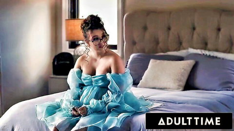 Leana Lovings in sexy blue off-shoulder prom dress on bed