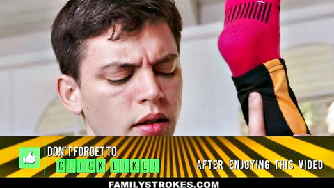 Intense young guy closeup face with red sock and FamilyStrokes like banner