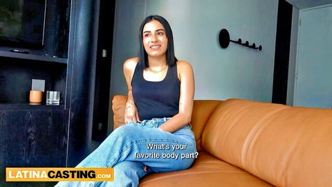 Smiling Indian teen with small tits in tank top and jeans casting interview