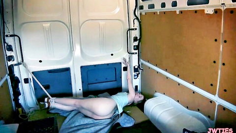 Alice Merchesi bound and exposed, legs spread in restraints