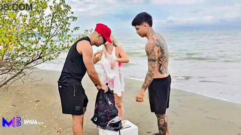 Beach threesome setup with Asian woman in white dress and two fit guys
