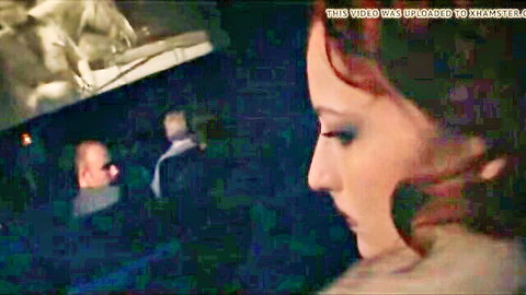 Redhead in fur coat seduces men in dark cinema, public tease