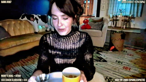 Brunette amateur in lacy black top holds mug and bowl, teasing for sexy dance and DP action