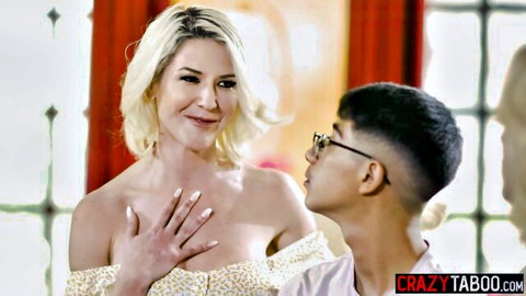 Blonde MILF in low-cut floral dress teases young Asian stud with deep cleavage
