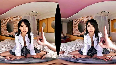 Asian schoolgirl in open blouse and plaid skirt teases with spread legs