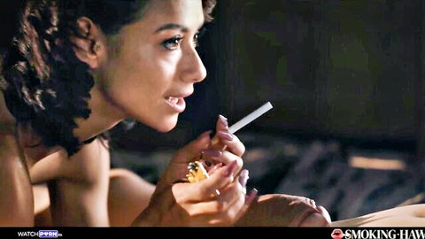 Veronica Leal smoking seductively topless, curly hair Latina beauty