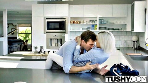Kacey Jordan petite blonde teen embraced passionately in kitchen by stud