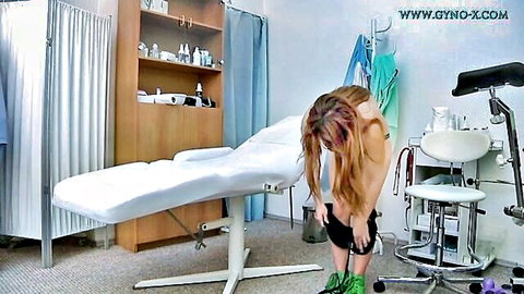 Loreen Stegal topless brunette bending over in gyno exam