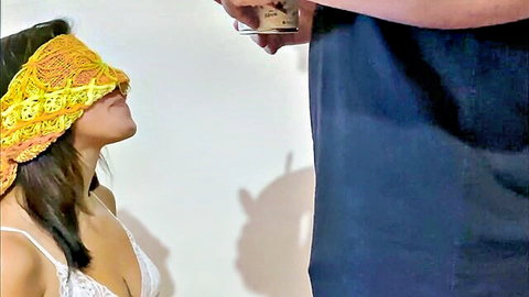 Blindfolded Asian woman in white lingerie teases with man filming playful game