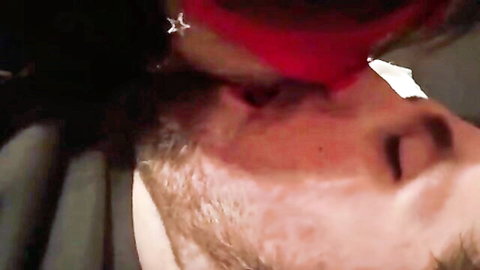 Blindfolded woman eagerly sucking bearded man's cock close-up