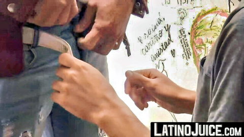 Latino guy unzips jeans as hands pull out his thick hard cock