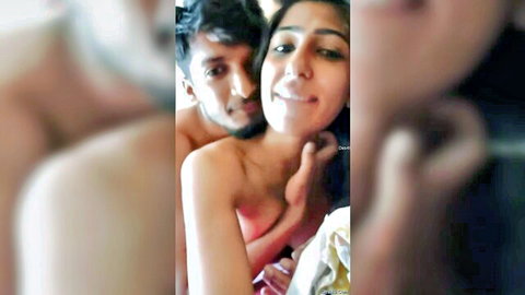 Intimate selfie of sexy Desi couple, shirtless man embracing smiling Indian woman