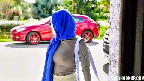 Big tits hijab girlfriend in blue headscarf by red car, Mardi Gras vibe