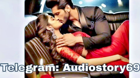 Passionate Indian couple kissing intimately, woman in red saree, man in suit