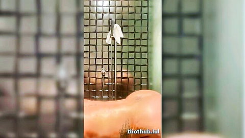 Tanned big juicy ass exposed in steamy tiled shower from behind