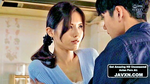 Beautiful Japanese stepmom in intimate kitchen moment with stepson