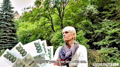 Mature blonde Czech woman offers cash for outdoor sex on street