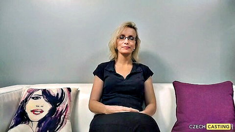 Blonde Czech casting hopeful in black top during interview