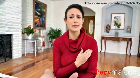 Upset brunette MILF stepmom clutches chest over tits in tight red sweater in taboo living room scene