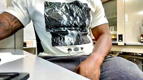 Tattooed black guy in white tee and gray sweats teases camera, gay amateur thumbnail