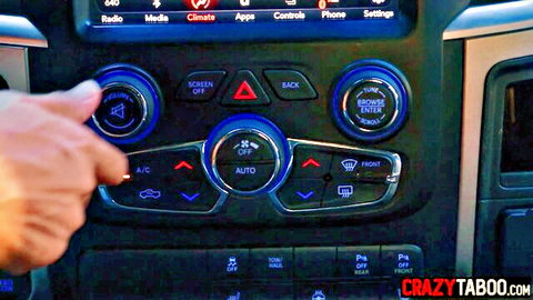 Blonde Kenna James in car, hand on AC controls awakening scene