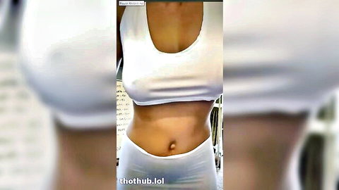 Christina Khalil teasing in white crop top and shorts, toned abs