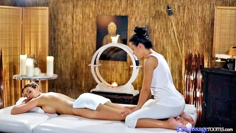 Nude big ass brunette gets oiled massage on bare thighs and buttocks by clothed masseuse