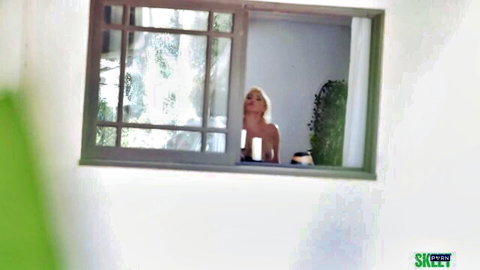 Chloe Rose topless blonde gazing out window in TeamSkeet scene