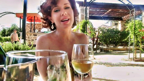 Veronica Love teases with big tits topless in public garden