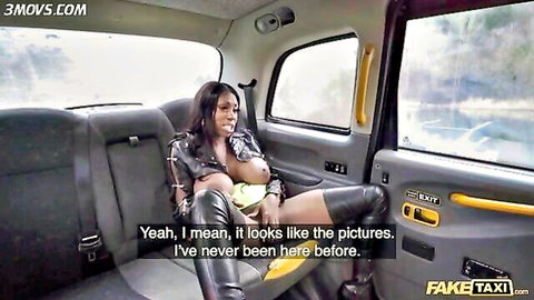 Curvy ebony babe exposing huge tits in FakeTaxi cab backseat wearing leather jacket and boots