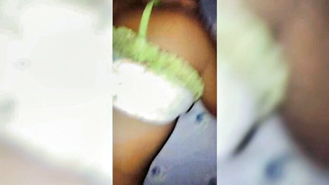 South Asian babe's brown thigh in sheer white panties with green lace garter tease