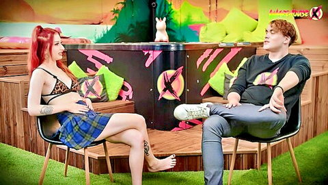 Gigi Rouge in lace bralette and plaid skirt on Podcast X interview