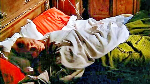 Vintage scene of older man lying in bed, tangled in white sheets, retro style
