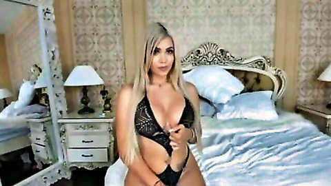Blonde stepsister in black lace lingerie masturbating with Lovense Lush toy