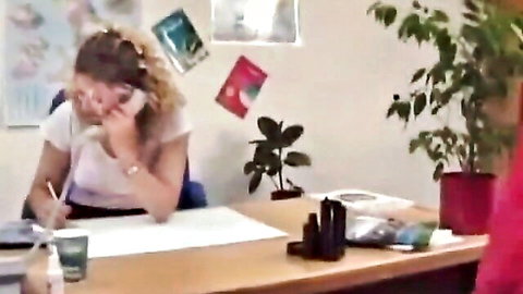 Young Alice on phone in white top, 1990s teen office tease