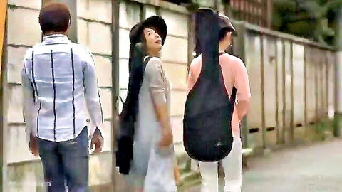 Cheating man walks with wife's cute Asian friend in dress and hat