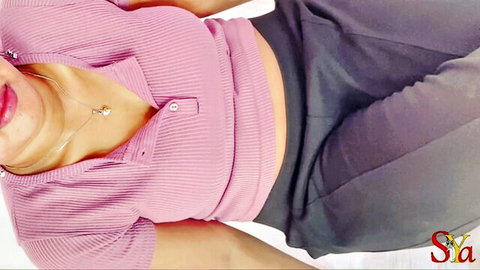 Sunny Leone as Indian bhabhi in pink buttoned top, teasing cleavage