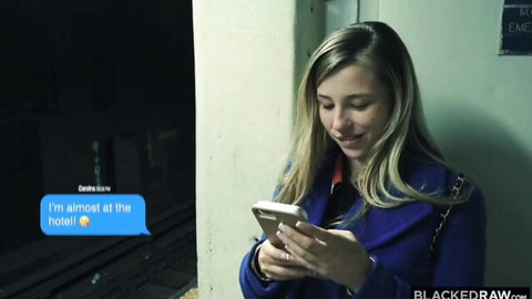 Smiling tiny blonde in blue coat texts in subway, Blacked Raw hookup tease