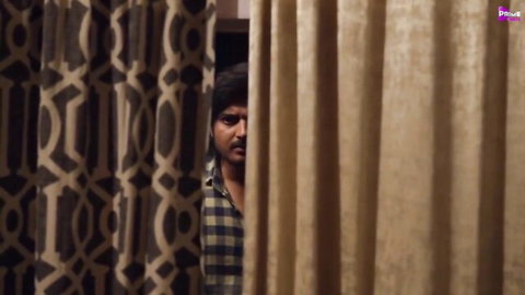 Indian man peeking intensely through curtains in Rivaaj Primeshots hot series