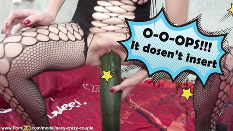Amateur MILF in fishnet stockings fails to insert thick green cucumber into her exposed pussy