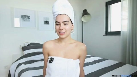 Sexy Portuguese woman in towel, smiling after shower tease