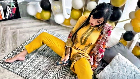 Aaliyah Yasin in sexy yellow outfit, teasing while waiting for guests