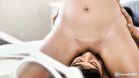 Hailey Rose nude arched pose with navel piercing and curvy body