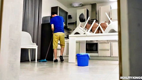 Jay Snake mopping kitchen floor in tight yellow shorts, teasing view