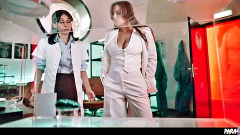 Emiri Momota in low-cut white suit with lab assistant in sci-fi infiltration