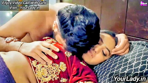 Desi couple in wedding lehenga shares intimate neck kiss embrace