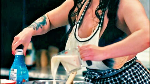 Korina Kova in sexy apron pouring liquid in cooking audition
