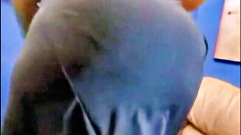 Granny's fat plump ass cheeks spilling from tight gray shorts
